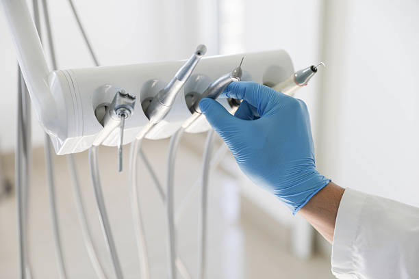 Professional Tooth Extraction technician working in Etowah, NC